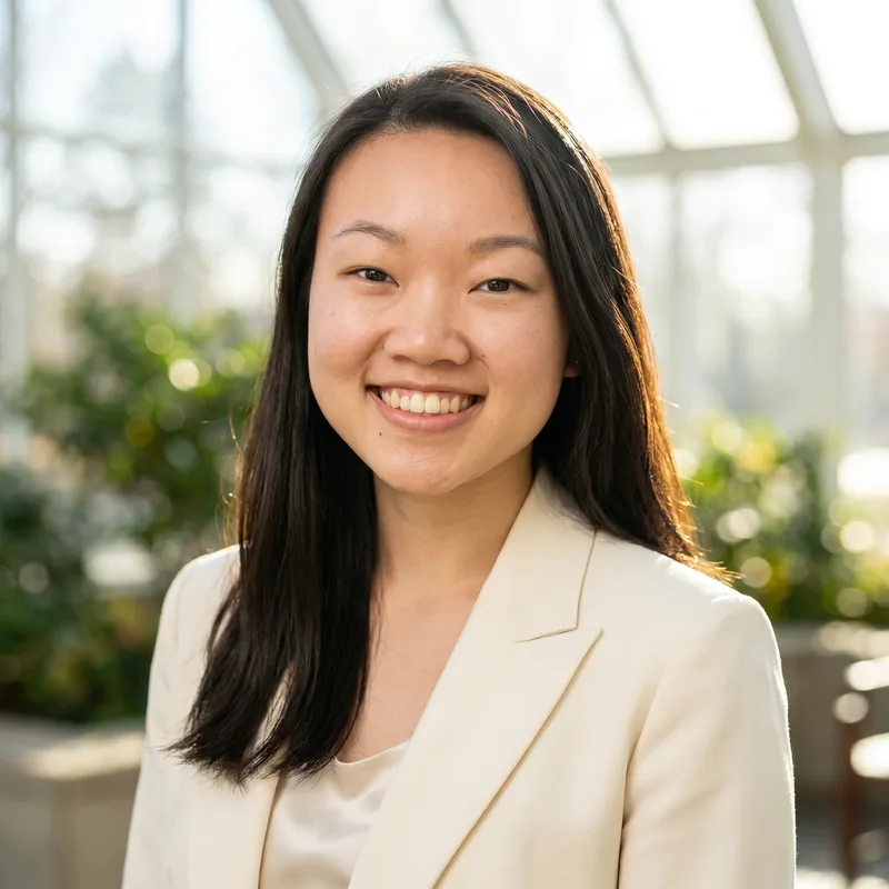 Dominique Huang's professional headshot