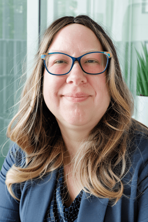 Professional headshot of Liz